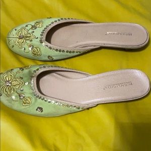 Lightly used size 11 green 1 inch heel shoes.